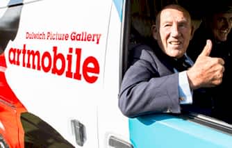 Sir Stirling Moss behind the wheel of new Gallery Artmobile